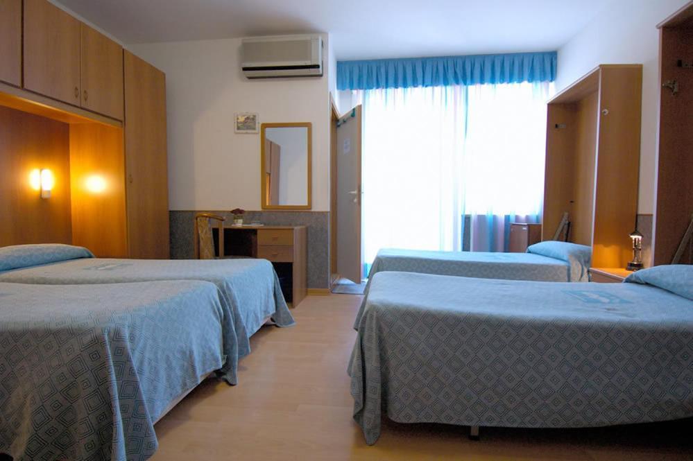 Hotel Ai Pini Grado Quarto foto